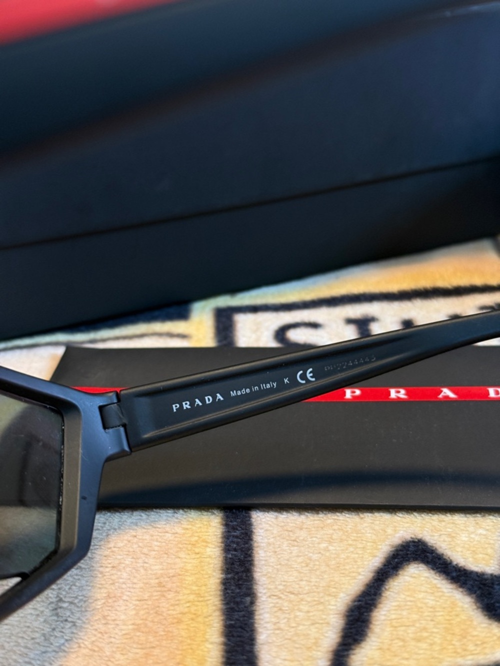 Prada Black Sunglasses with Purple Mirrored Lenses - Picture 3 of 4